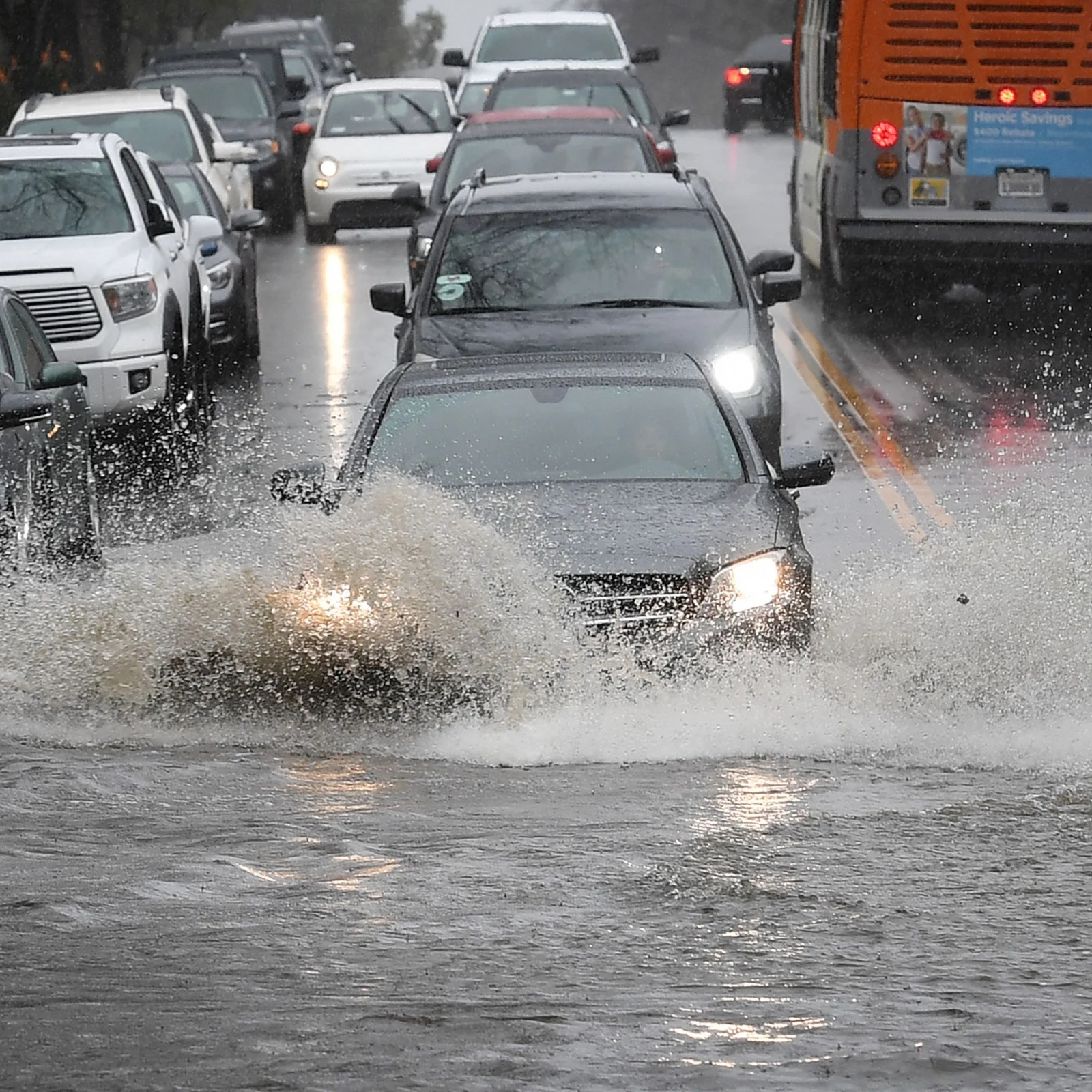 Hybrid car flodded in rain water.
